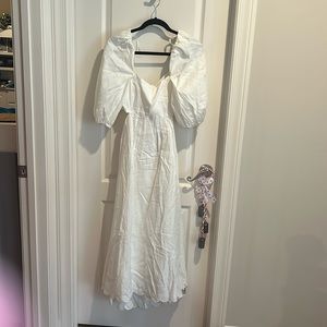 Ivory colored long dress, open back